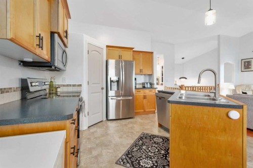 70 Garden Road, Lacombe, AB - Indoor Photo Showing Kitchen With Double Sink