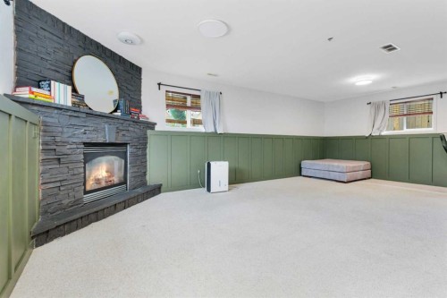 70 Garden Road, Lacombe, AB - Indoor With Fireplace