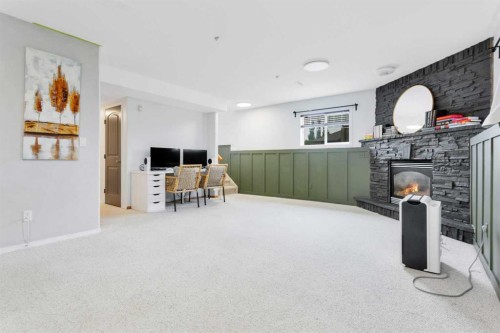 70 Garden Road, Lacombe, AB - Indoor With Fireplace