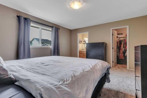 68 Isbister Close, Red Deer, AB - Indoor Photo Showing Bedroom