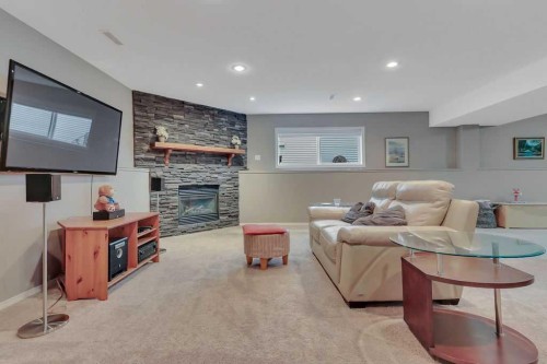 68 Isbister Close, Red Deer, AB - Indoor With Fireplace
