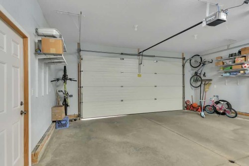 68 Isbister Close, Red Deer, AB - Indoor Photo Showing Garage