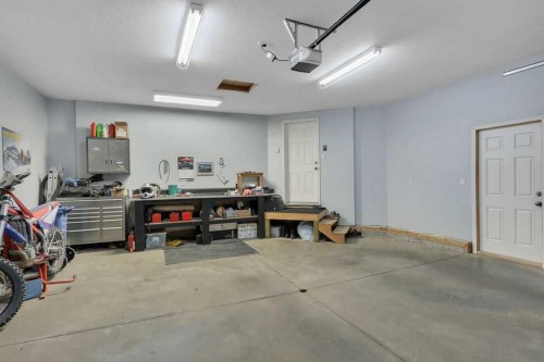 68 Isbister Close, Red Deer, AB - Indoor Photo Showing Garage