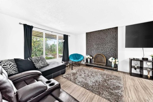 165 Wilson Crescent, Red Deer, AB - Indoor Photo Showing Living Room With Fireplace
