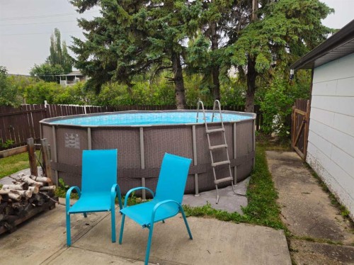 165 Wilson Crescent, Red Deer, AB - Outdoor With Above Ground Pool