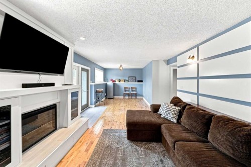 60 Conners Crescent, Red Deer, AB - Indoor Photo Showing Living Room With Fireplace