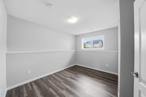 84 Heartland Crescent, Penhold, AB - Indoor Photo Showing Other Room
