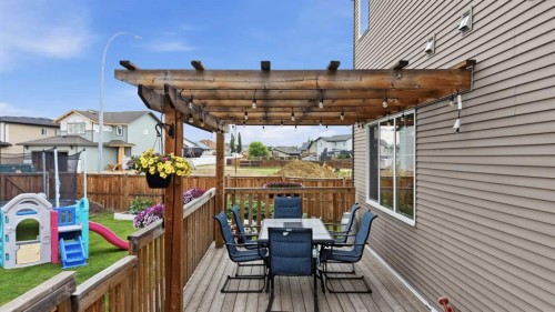 217 Augustus Way, Penhold, AB - Outdoor With Deck Patio Veranda With Exterior