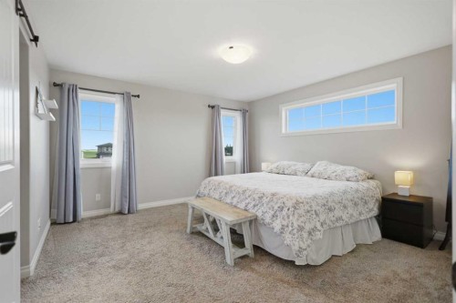 217 Augustus Way, Penhold, AB - Indoor Photo Showing Bedroom