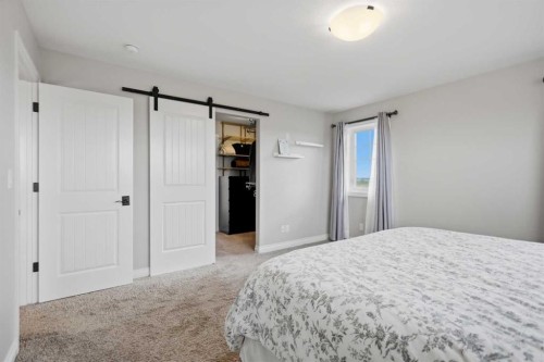 217 Augustus Way, Penhold, AB - Indoor Photo Showing Bedroom