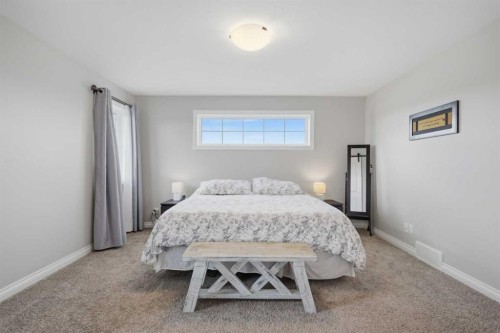 217 Augustus Way, Penhold, AB - Indoor Photo Showing Bedroom