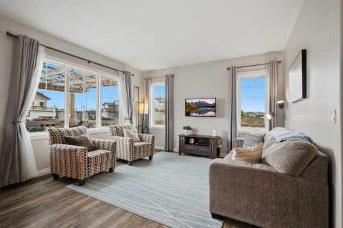 217 Augustus Way, Penhold, AB - Indoor Photo Showing Living Room