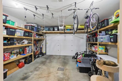 217 Augustus Way, Penhold, AB - Indoor Photo Showing Garage