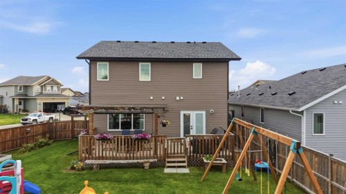 217 Augustus Way, Penhold, AB - Outdoor With Deck Patio Veranda With Exterior