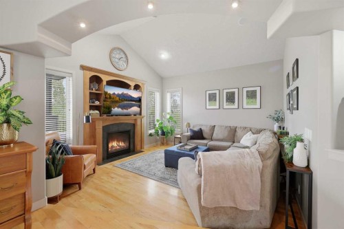 106 Oaklands Crescent, Red Deer, AB - Indoor Photo Showing Living Room With Fireplace
