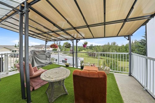 2 Estella Crescent, Lacombe, AB - Outdoor With Deck Patio Veranda With Exterior