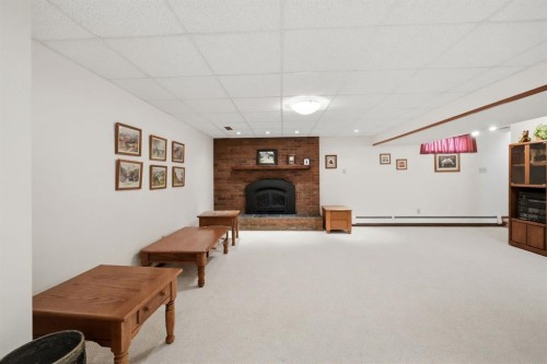 4021 Embury Crescent, Red Deer, AB - Indoor With Fireplace