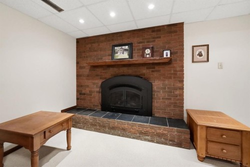 4021 Embury Crescent, Red Deer, AB - Indoor Photo Showing Other Room With Fireplace