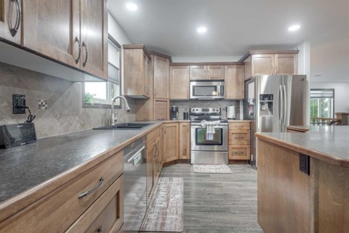 49 Castella Crescent, Red Deer, AB - Indoor Photo Showing Kitchen With Double Sink With Upgraded Kitchen