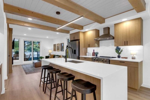 526-608 7 Avenue, Canmore, AB - Indoor Photo Showing Kitchen With Upgraded Kitchen