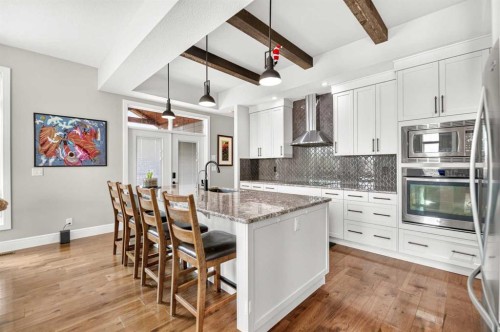 77 Grove Close, Red Deer, AB - Indoor Photo Showing Kitchen With Upgraded Kitchen