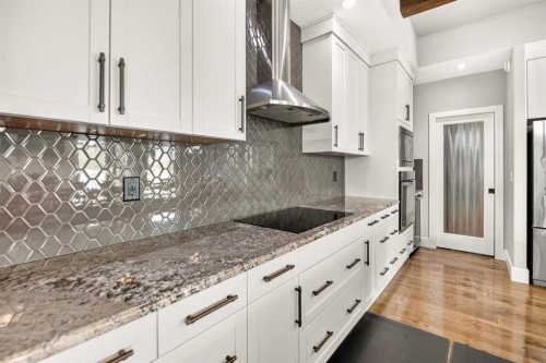 77 Grove Close, Red Deer, AB - Indoor Photo Showing Kitchen With Upgraded Kitchen