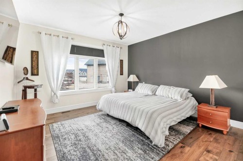 77 Grove Close, Red Deer, AB - Indoor Photo Showing Bedroom