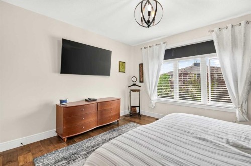 77 Grove Close, Red Deer, AB - Indoor Photo Showing Bedroom