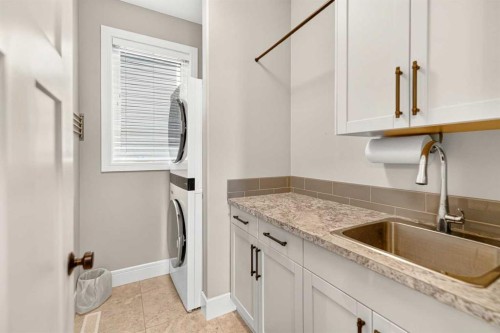 77 Grove Close, Red Deer, AB - Indoor Photo Showing Laundry Room