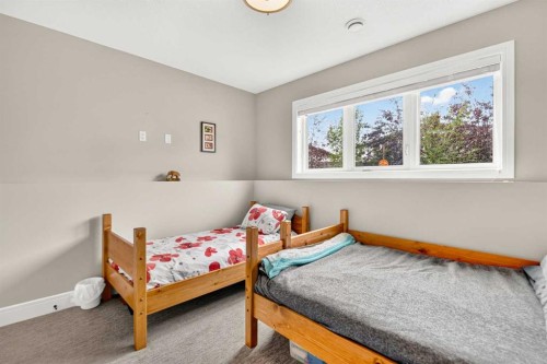 77 Grove Close, Red Deer, AB - Indoor Photo Showing Bedroom