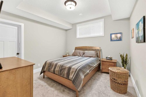 77 Grove Close, Red Deer, AB - Indoor Photo Showing Bedroom