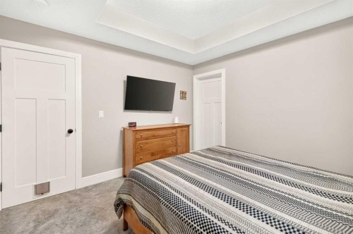 77 Grove Close, Red Deer, AB - Indoor Photo Showing Bedroom