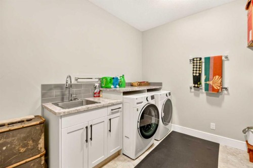 77 Grove Close, Red Deer, AB - Indoor Photo Showing Laundry Room