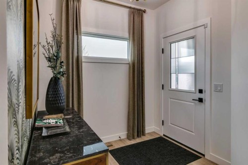 59 Creekside Rise Sw, Calgary, AB - Indoor Photo Showing Other Room