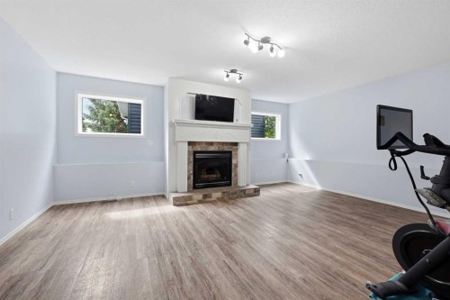 2 Denmark Crescent, Red Deer, AB - Indoor Photo Showing Living Room With Fireplace
