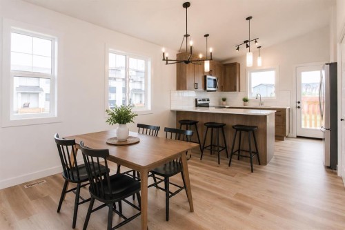 5 Beacon Hill Drive, Sylvan Lake, AB - Indoor Photo Showing Dining Room