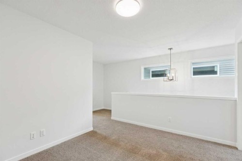 65 Aquila Terrace Nw, Calgary, AB - Indoor Photo Showing Other Room