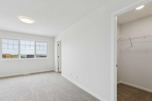 65 Aquila Terrace Nw, Calgary, AB - Indoor Photo Showing Other Room