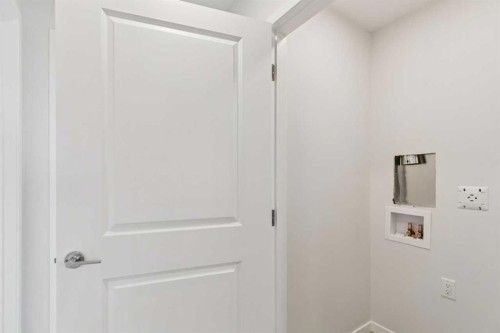 65 Aquila Terrace Nw, Calgary, AB - Indoor Photo Showing Other Room