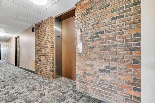 207-4820 47 Avenue, Red Deer, AB - Indoor Photo Showing Other Room