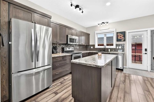 146 Morris Court, Blackfalds, AB - Indoor Photo Showing Kitchen With Upgraded Kitchen