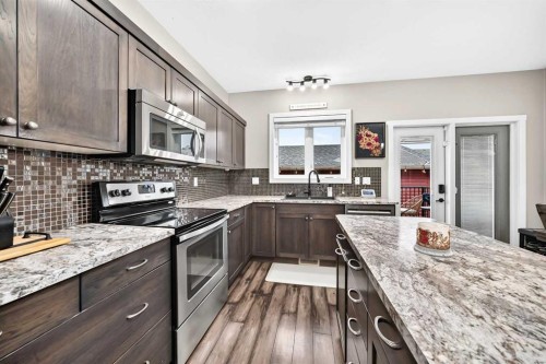 146 Morris Court, Blackfalds, AB - Indoor Photo Showing Kitchen With Upgraded Kitchen