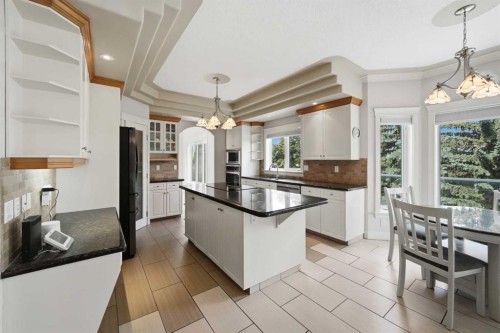 25 Ashmore Close, Red Deer, AB - Indoor Photo Showing Kitchen With Upgraded Kitchen