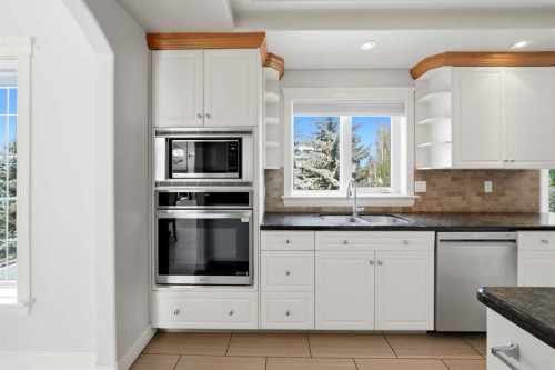 25 Ashmore Close, Red Deer, AB - Indoor Photo Showing Kitchen With Double Sink