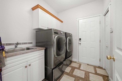 25 Ashmore Close, Red Deer, AB - Indoor Photo Showing Laundry Room