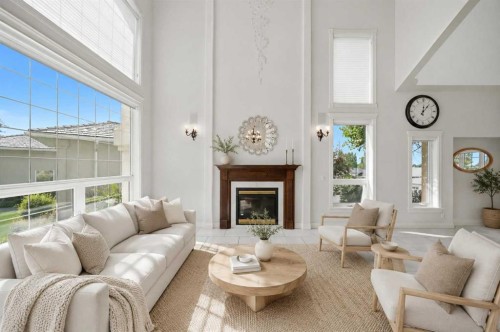 25 Ashmore Close, Red Deer, AB - Indoor Photo Showing Living Room With Fireplace