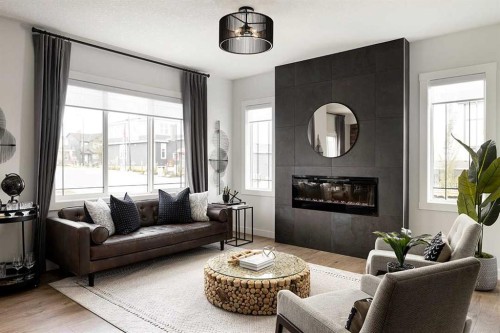 63 Annette Hill Nw, Calgary, AB - Indoor Photo Showing Living Room With Fireplace