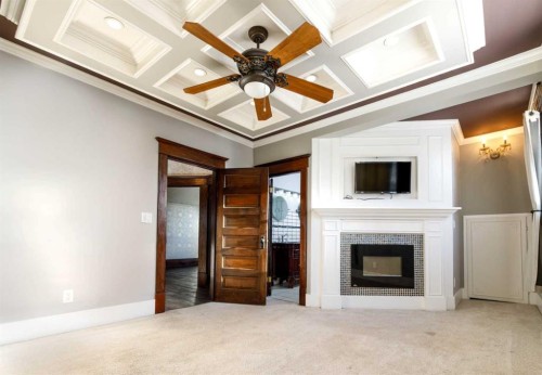 4736 56 Street, Red Deer, AB - Indoor Photo Showing Other Room With Fireplace