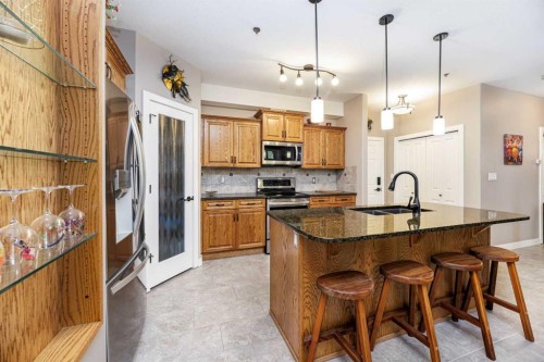 109-5213 61 Street, Red Deer, AB - Indoor Photo Showing Kitchen With Double Sink With Upgraded Kitchen