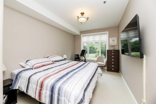 109-5213 61 Street, Red Deer, AB - Indoor Photo Showing Bedroom